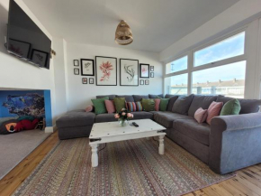 No 28 Contemporary beach side property with sea views